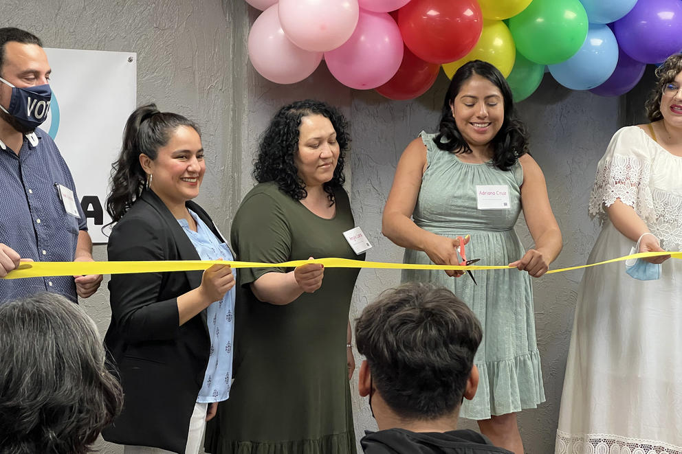 People at a ribbon-cutting ceremony