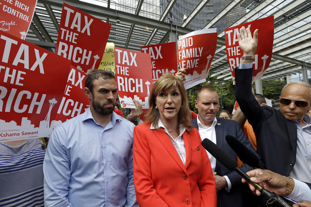 Susan Hutchison amid media