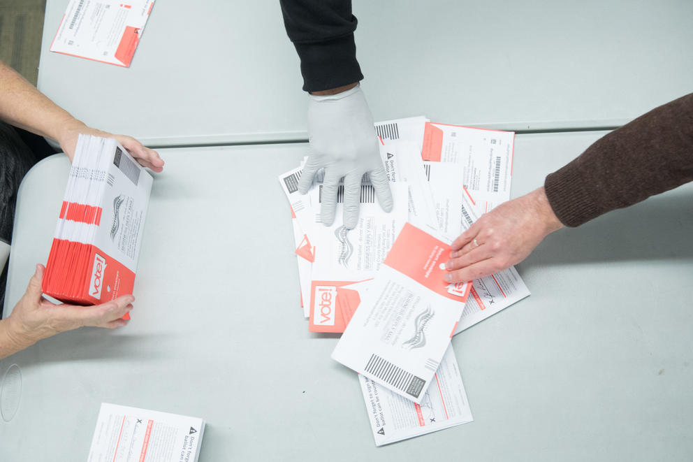 ballots being sorted