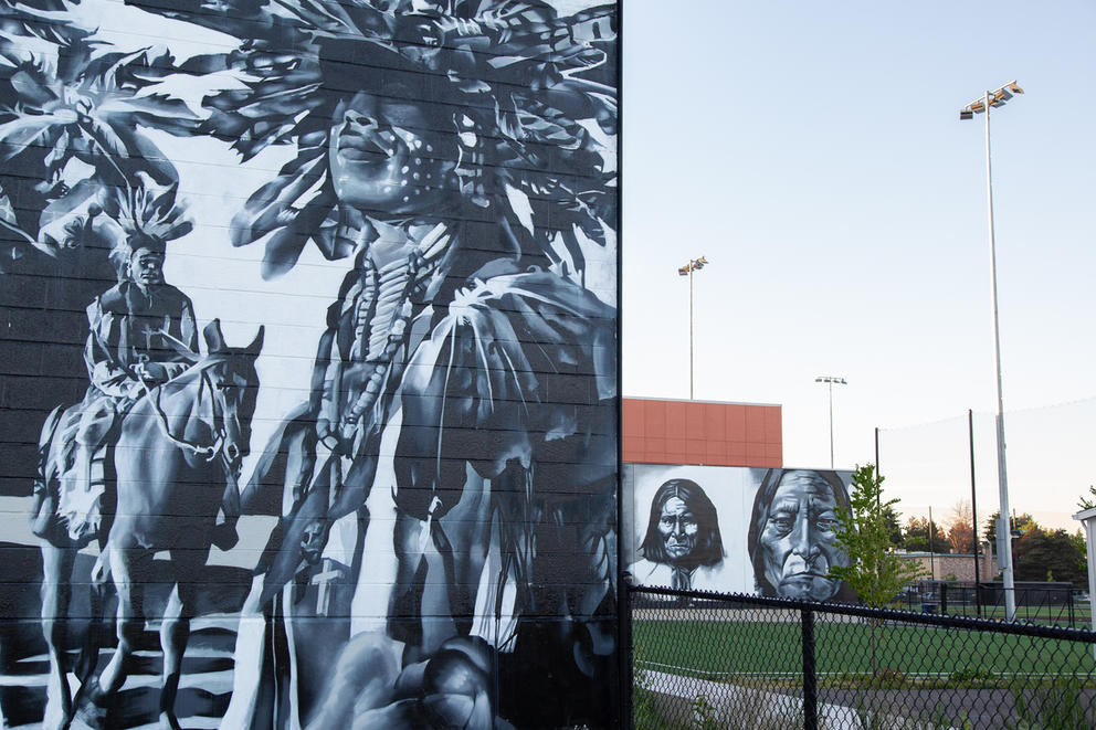 Murals by Andrew Morrison on the side of the Licton Springs K-8/Robert Eagle Staff Middle School