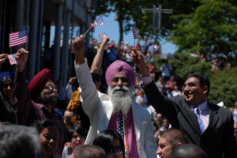 Newly minted citizens celebrate at Seattle Center's annual Fourth of July naturalization ceremony. 