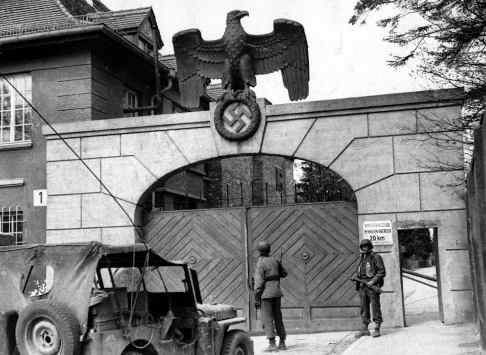 Soldiers in front of a gate