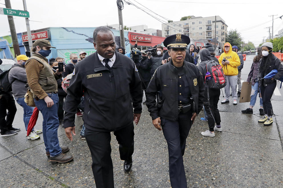 Seattle fire chief and police chief walking