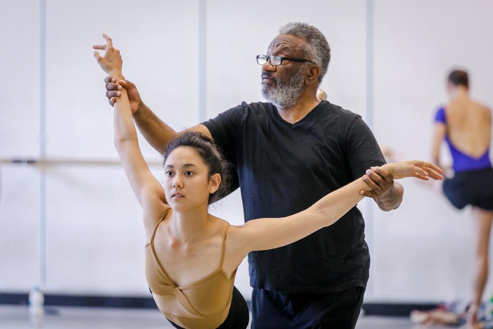 Choreographer Donald Byrd works with a dancer