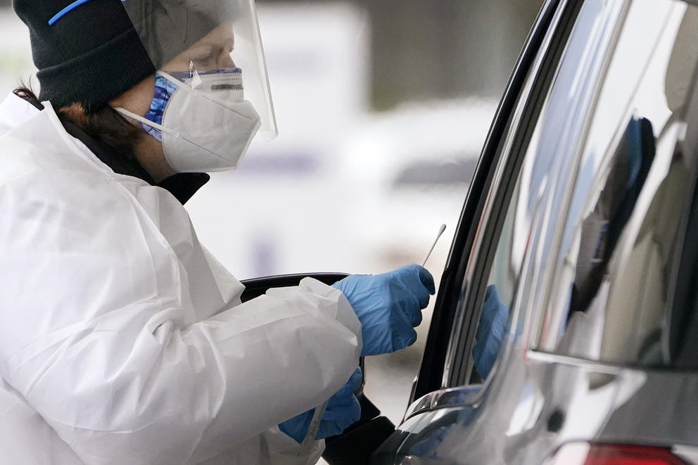 person outside a car at a testing center in Bellingham