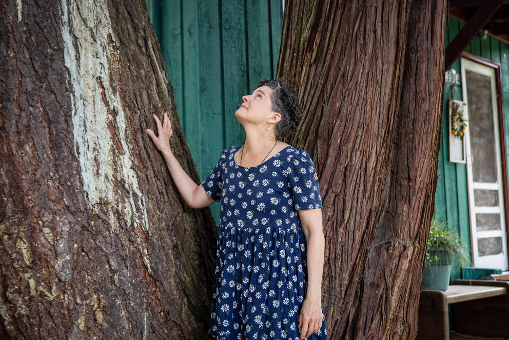 woman looking at tree