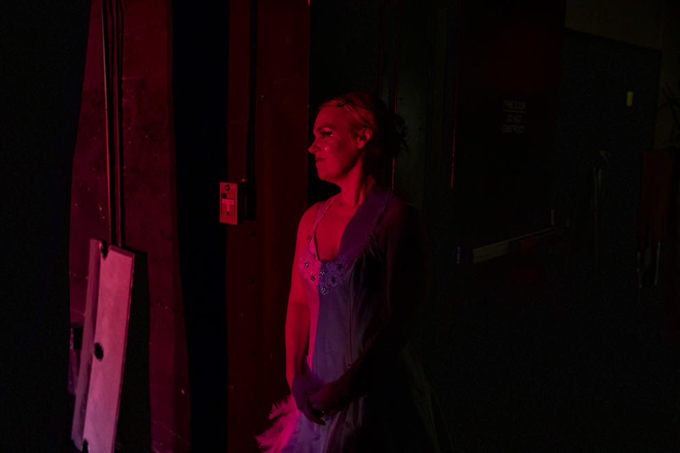 Diana in red light backstage