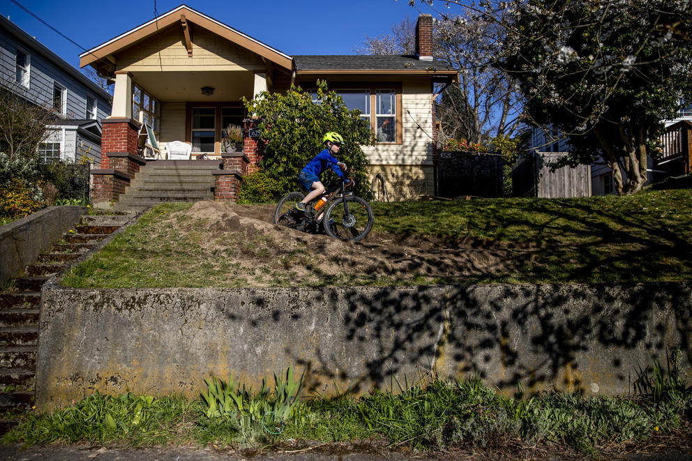 Hugo Flanagan, 8, rides his bike 