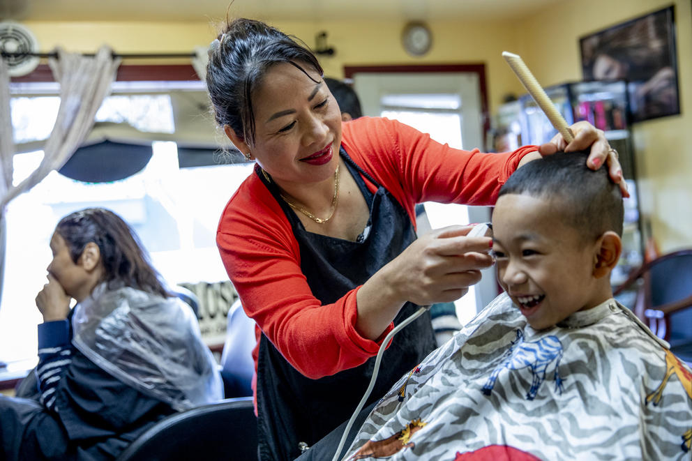 Nary cuts little boy's hair