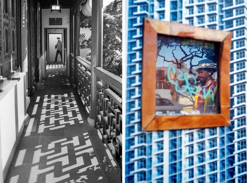 At left, a black and white image of a person walking through a doorway, shadows are cast on the floor by designs in a railing. At right, the reflection of a man in a hard hat and vest is seen in a framed image on a blue patterned wall 