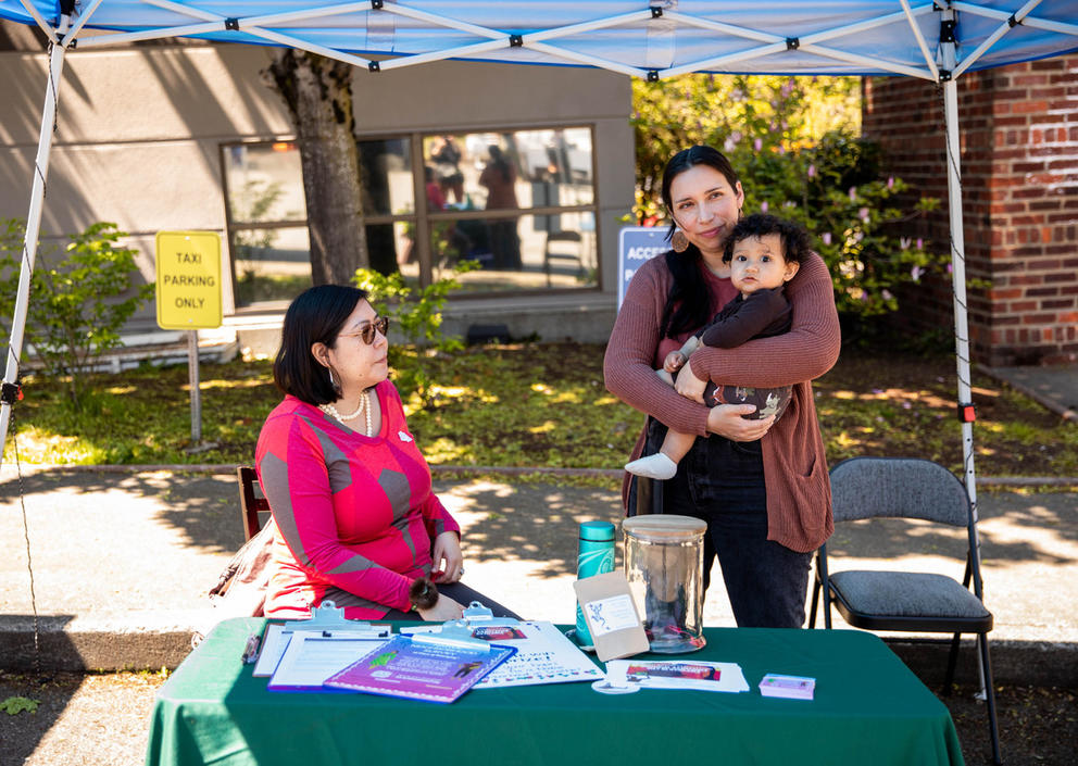 Demarus Tevuk and Kimberly Deriana with her child Khalako Lloyd 