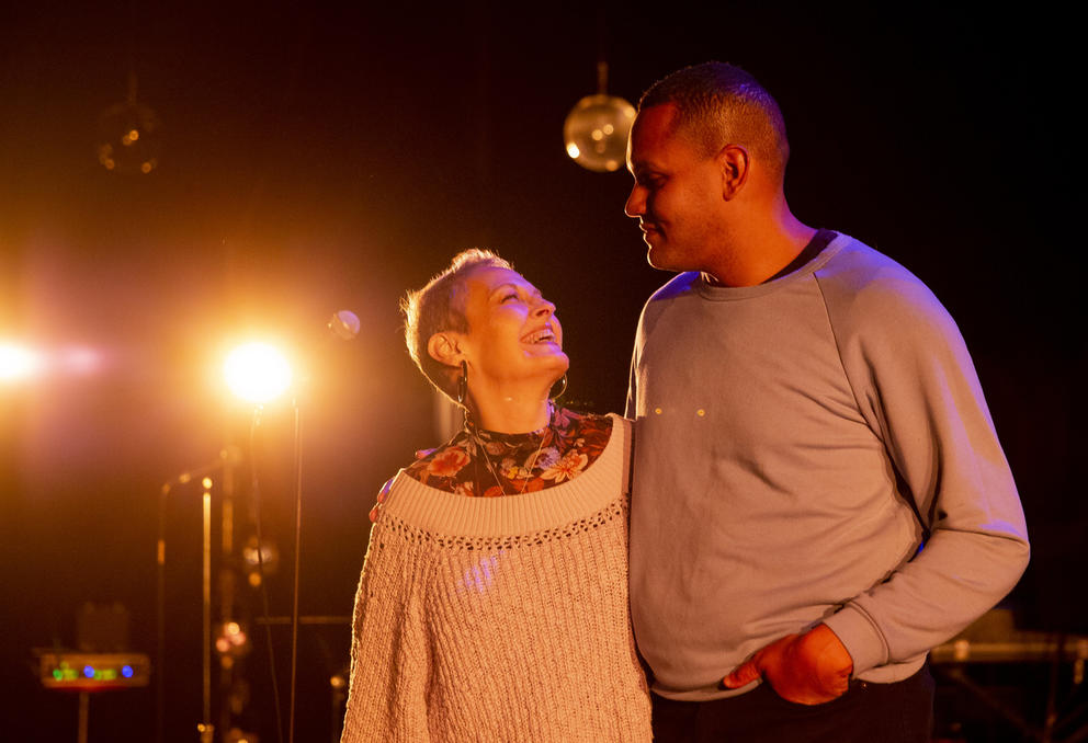 Ahamefule J. Oluo with his mother, Susan Oluo, on the stage at On The Boards. 