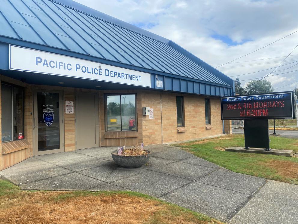 The Pacific Police Department building and next to it an electronic reader sign