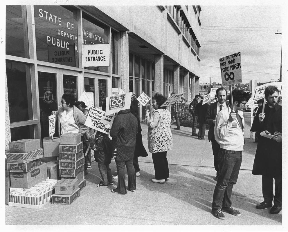 People holding signs