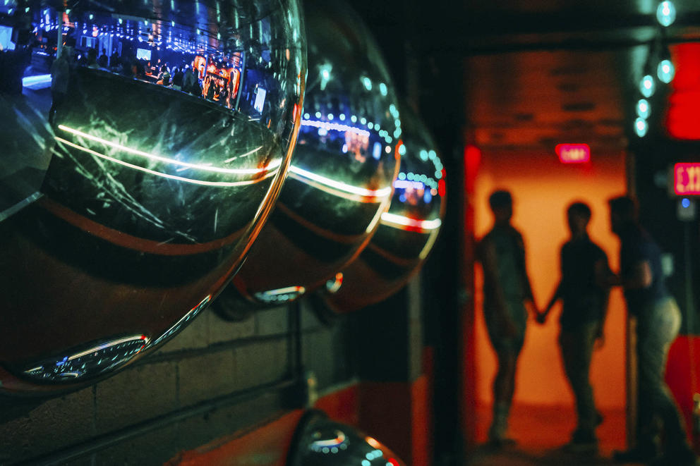 The bar is reflected in convex mirrors 