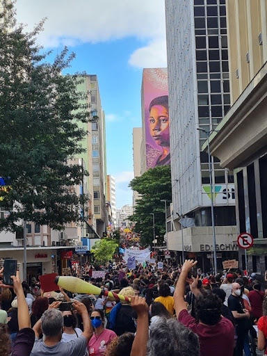 People gather on a city street