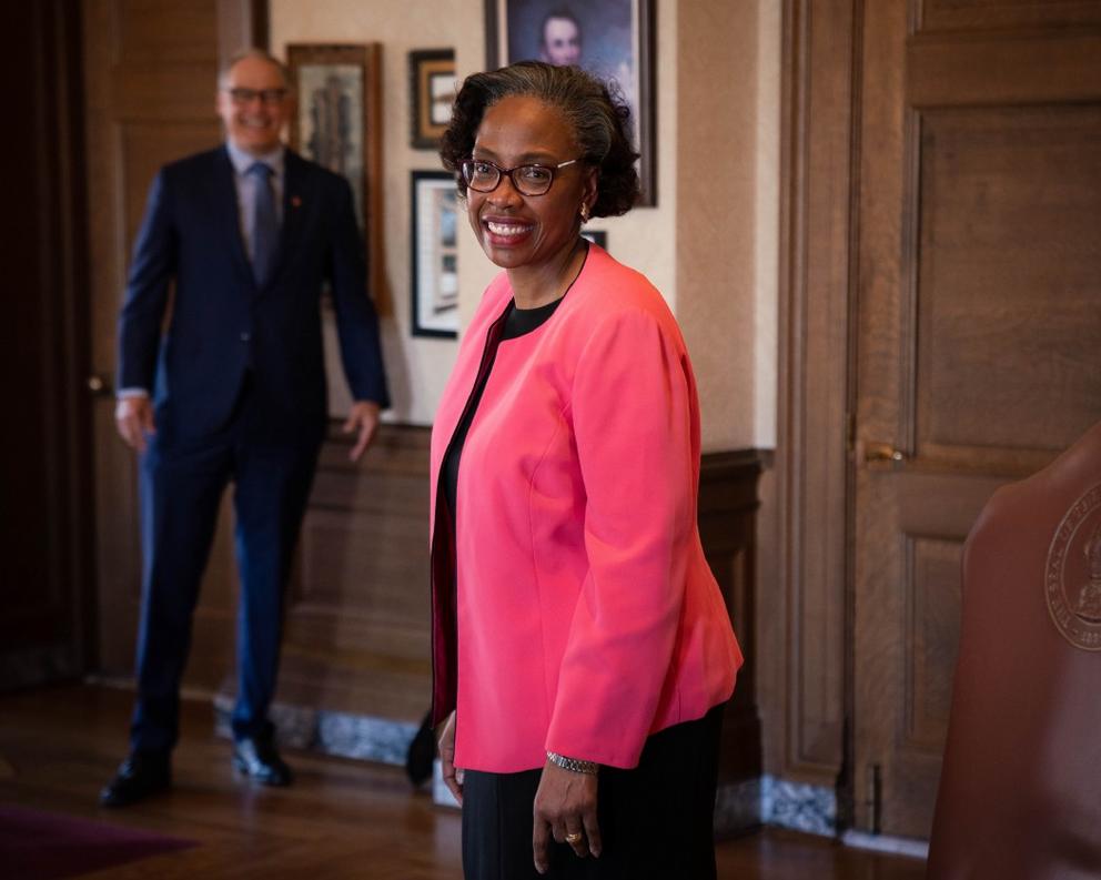 G. Helen Whitener, with Gov. Jay Inslee in background