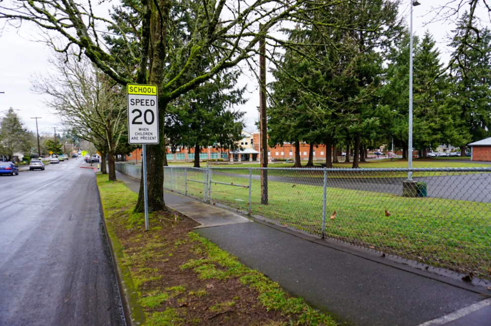 ‘School Zone’ speed limit sign along roadside