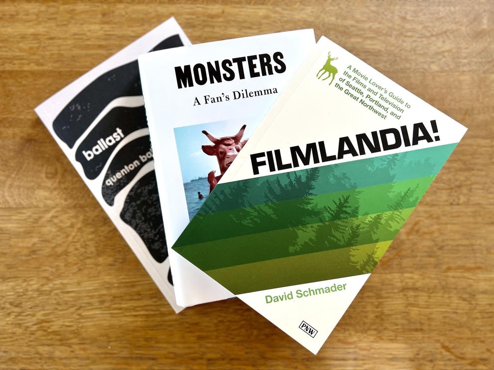 three books laid on a table, the top reading Filmlandia!