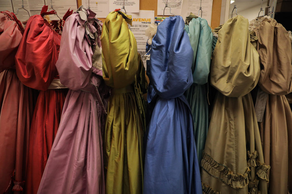 Colorful 19th century dresses on a rack