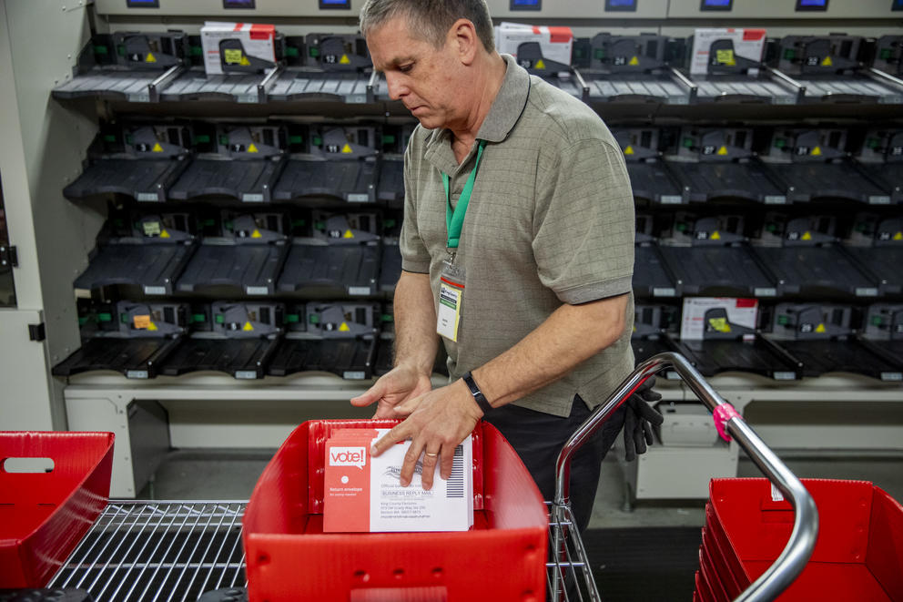 Ballots are sorted at the King County Elections headquarters