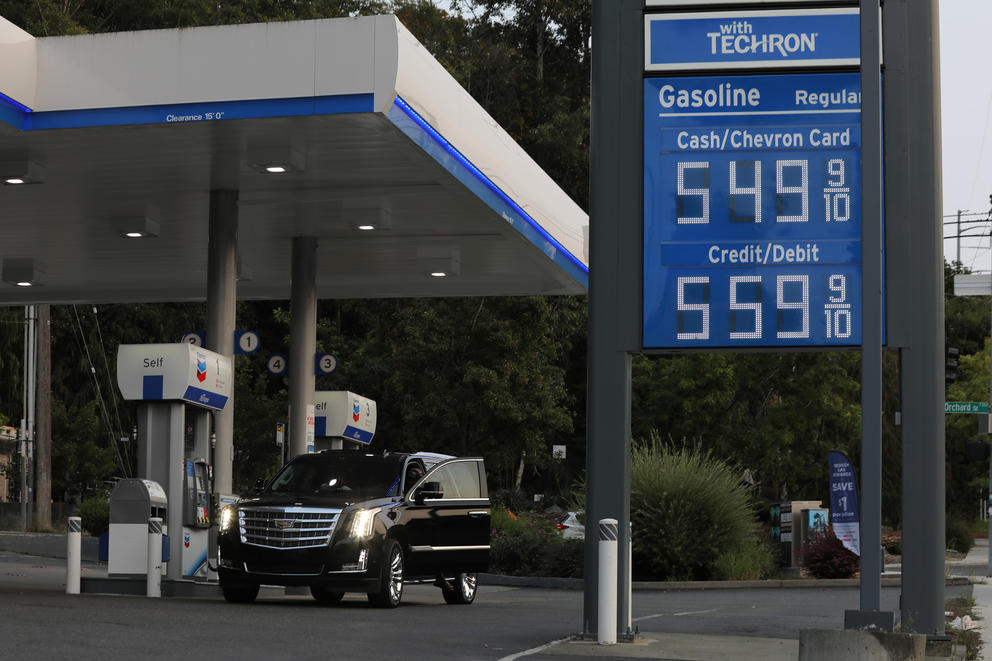 A sign at a Chevron station in Washington shows a regular price of $5.49 a gallon.