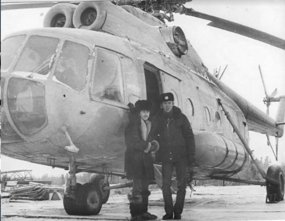 Sergey Pogosyan, left, in Baku, Azerbaijan in 1986, in front of an airplane