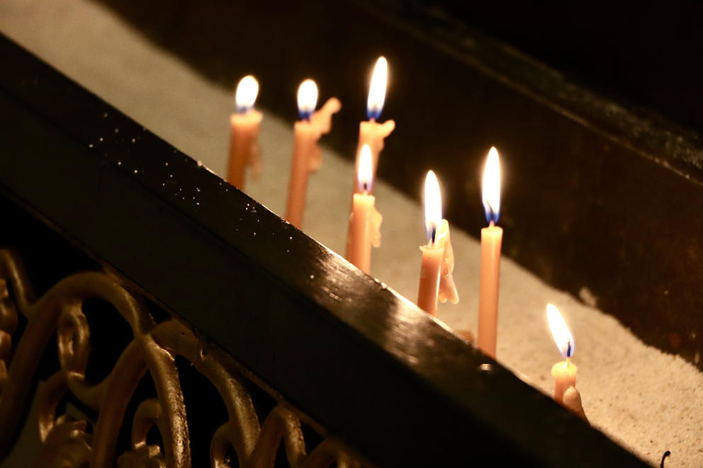 Candles of remembrance lit by members of the church.