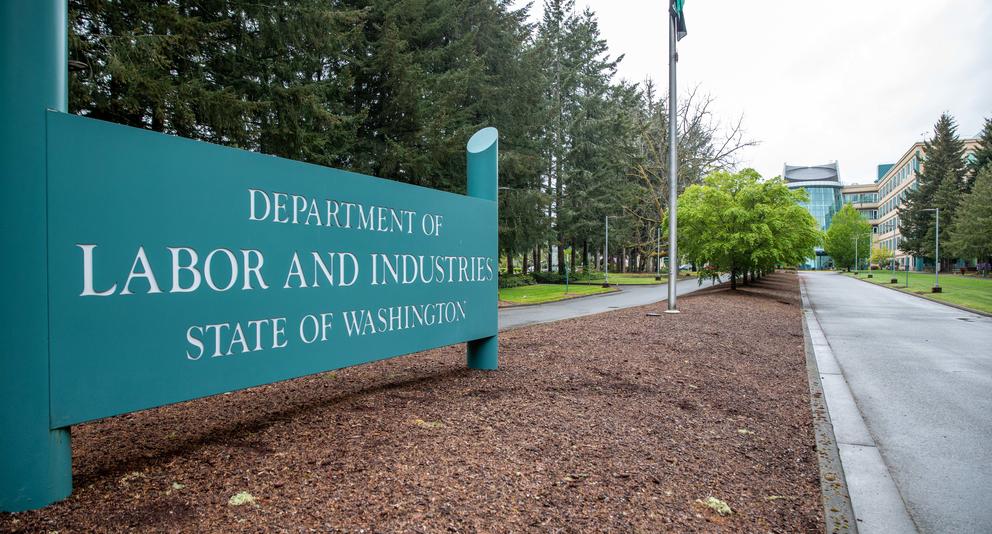 Close up of Washington State's Department of Labor & Industries sign outside headquarters in Tumwater, WA.