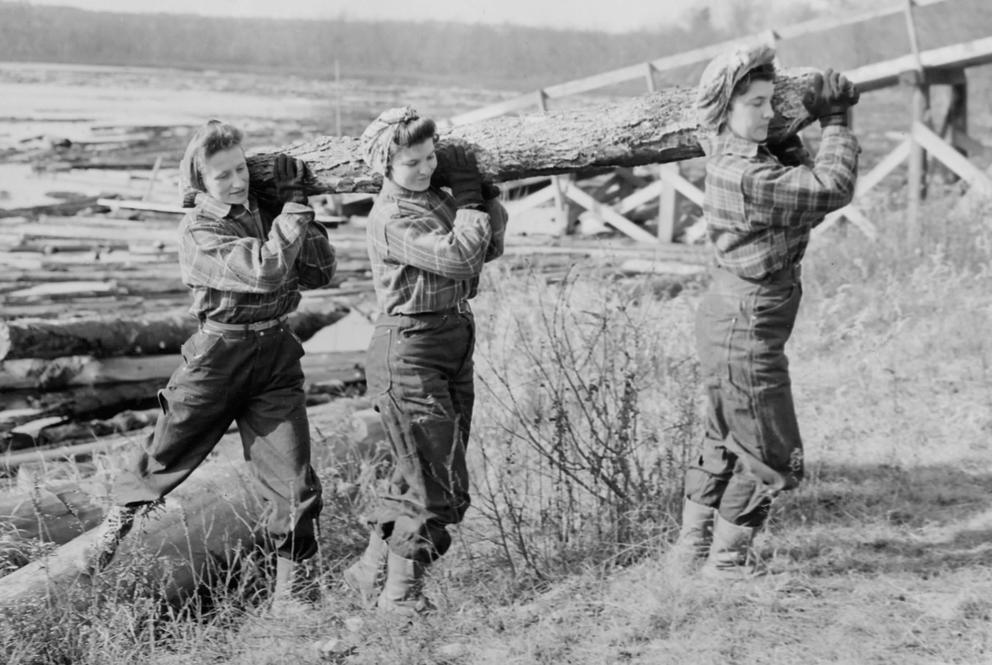 Young women working as log drivers during WWII