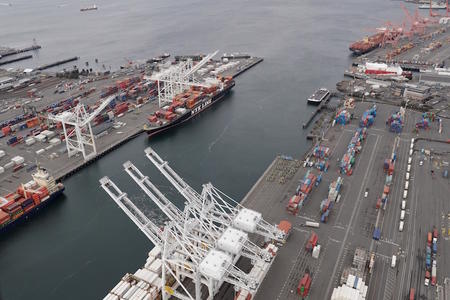 Cargo cranes at the Port of Seattle are shown in this aerial photo, Friday, Feb. 23, 2018, in Seattle. (AP Photo/Ted S. Warren)