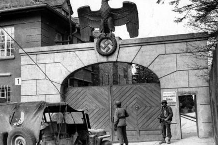 Soldiers in front of a gate