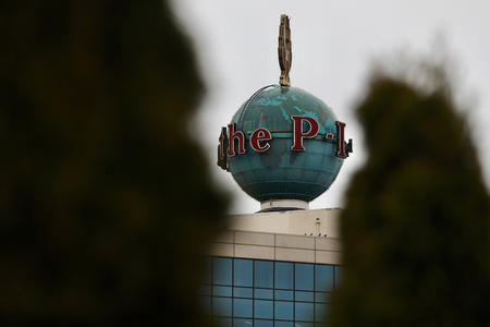 Seen from Myrtle Edwards Park, the landmark Seattle Post-Intelligencer globe still sits atop the defunct newspaper's former offices.