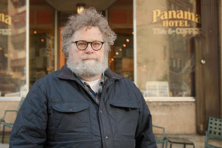 Knute Berger stands in front of the Panama Hotel